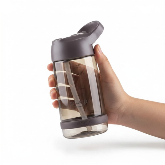 Hand holding a clear water bottle 