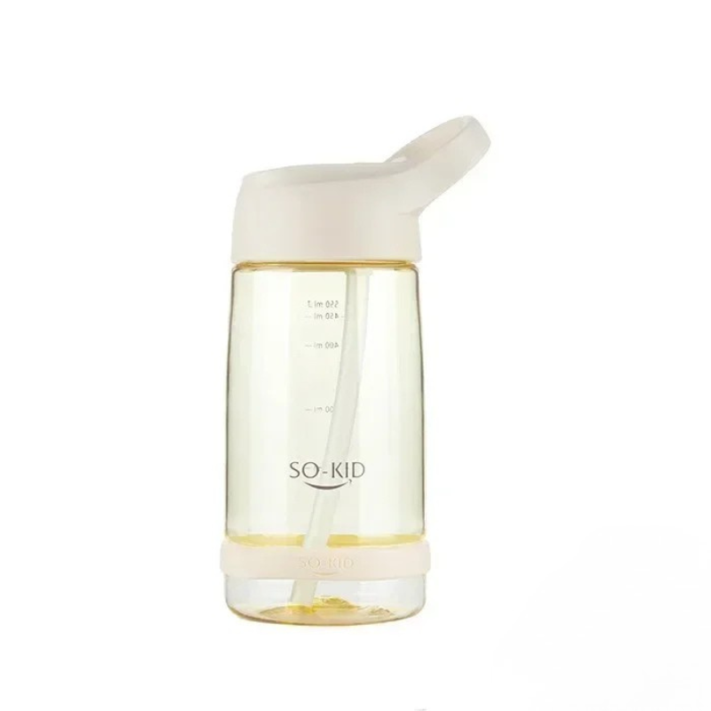 Clear bottle with beige cap and base on a white background